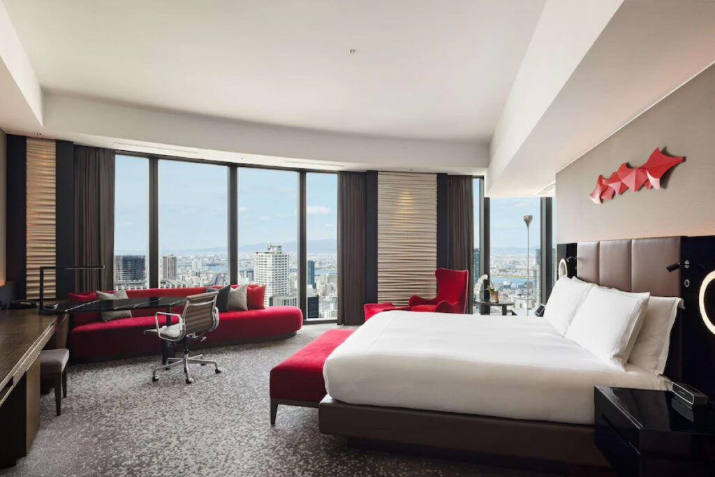 Modern luxury hotel room at Conrad Osaka with city view