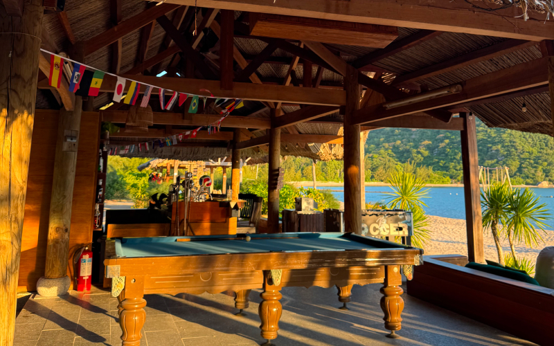 Beach bar with ocean sunset view at L'Alya Ninh Van Bay Vietnam honeymoon resort Nha Trang